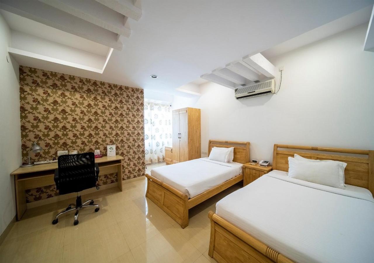 Capital O 46966 Apollo 27 Hotel Bangalore Exterior photo